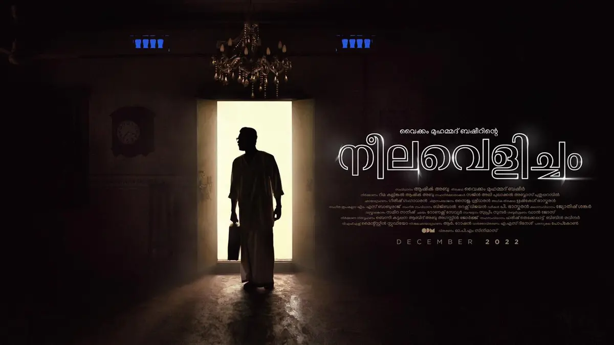 Movie poster for Neelavelicham with credits typeset in Manjari